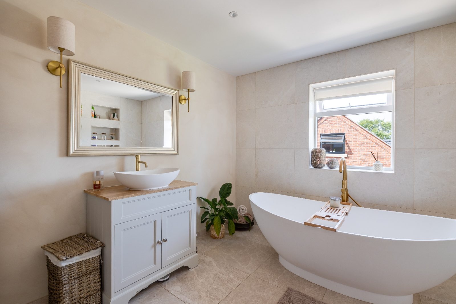 Bathroom vanity, framed mirror and freestanding bath from the existing project gallery